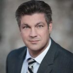 Christopher J. Miller