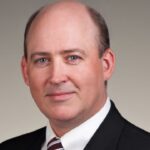 Christopher M. Adams