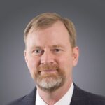 John E. Carlson