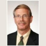 Brett A. August