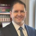 Tyler J. Smith