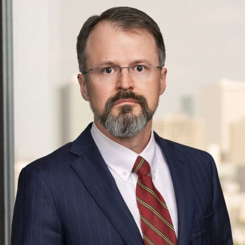 W. Justin Adams