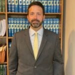 Christopher L. Isom