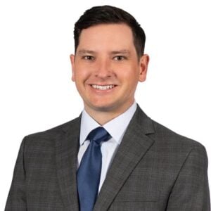 Travis J. Adams