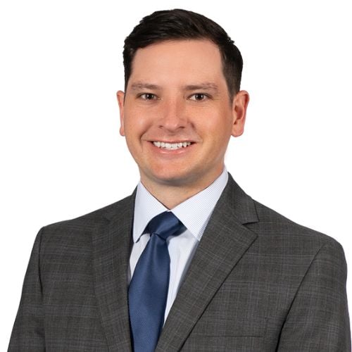 Travis J. Adams