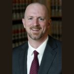 J. Matthew Coe
