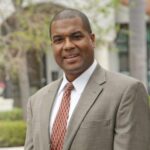 Vincent E. Miller