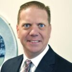 Aaron D. Adams