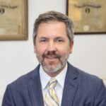 Adam H. Miller