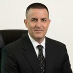 Gregory H. Comings