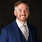 John D. Goeppinger