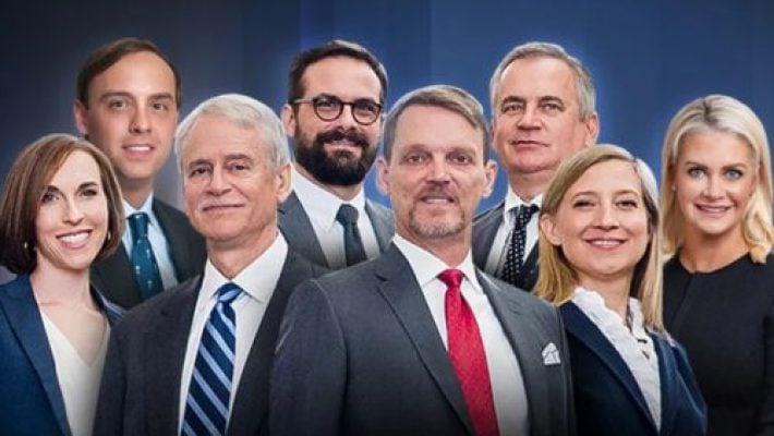 Henry E. Teich with team