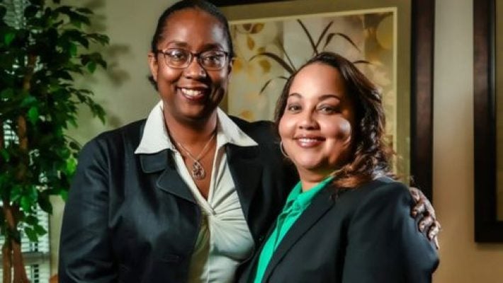 Jazmin G. Caldwell with team